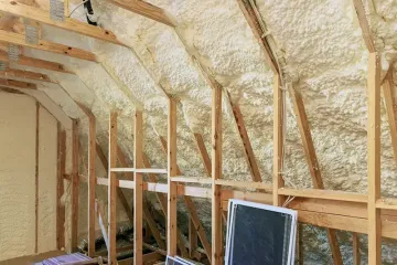New house under construction is insulated with spray foam thermal hydro insulation