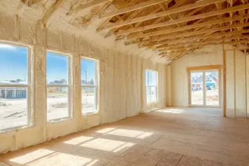 Spray Foam Insulation Application in New Construction Home Interior, Energy Efficient Building Design